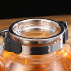 Birnenförmige Glasteekanne mit schwarzem Griff 800ml