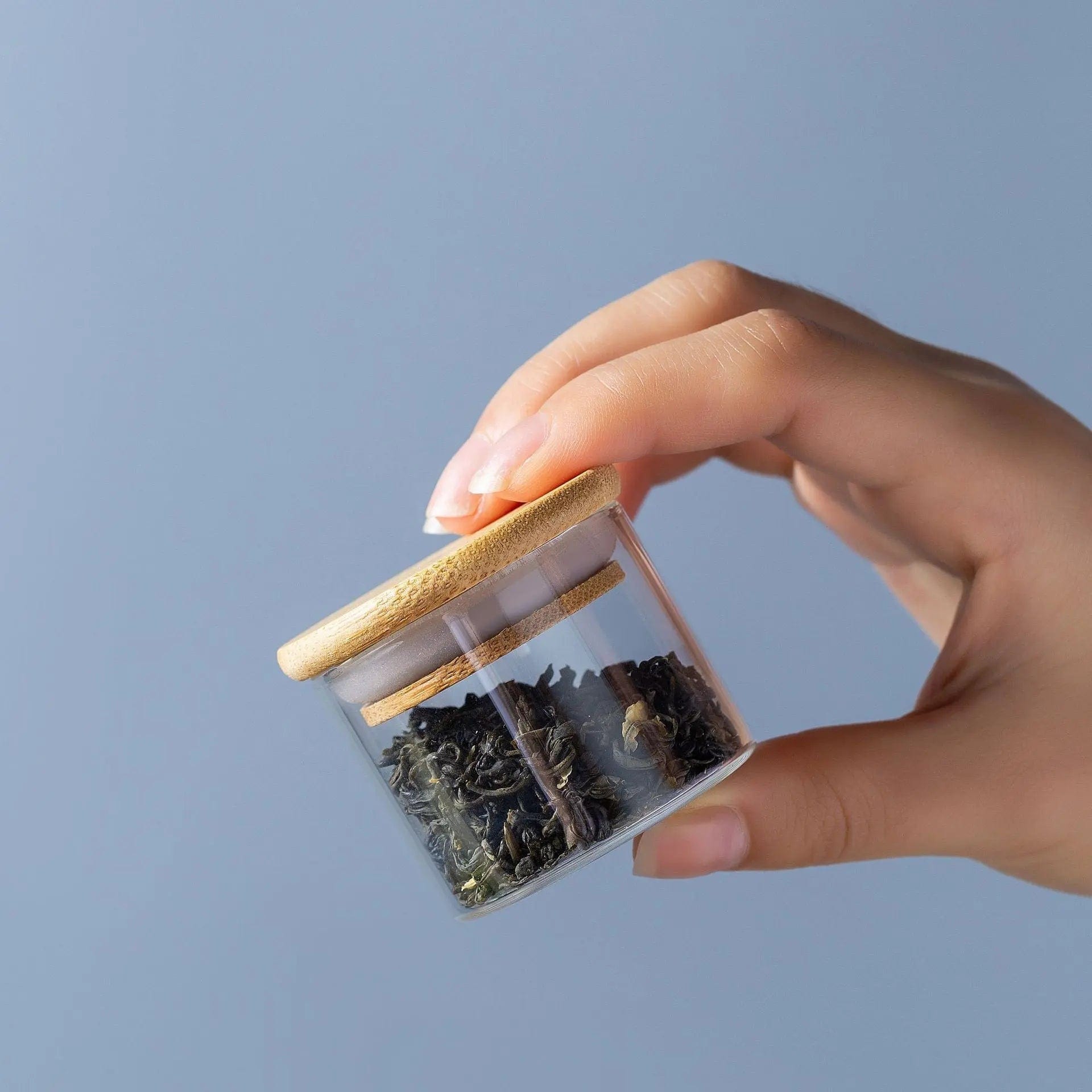 Kleine Teedose aus Glas