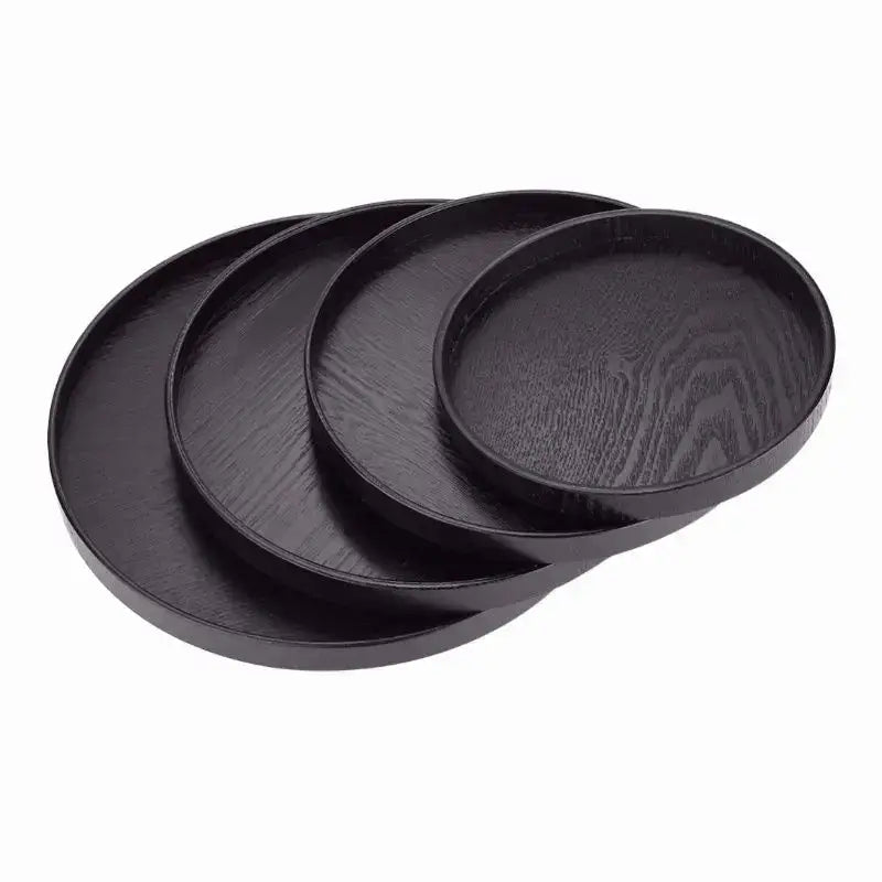 Rundes schwarzes Serviertablett