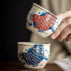 Porzellan-Teetasse mit Karpfenmotiv 120ml