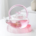 Rosa Glasteekanne mit Schmetterling 700ml