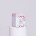 Rosa Metall-Teedose mit Blumen