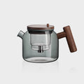 Runde Glas-Teekanne mit Holzgriff und Infuser-Knopf 700ml