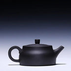 Schwarze Yixing-Ton-Teekanne mit Blumen 200 ml