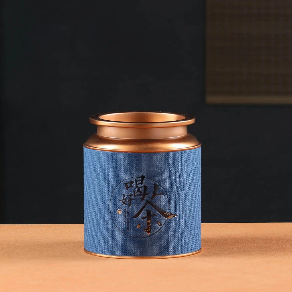 Teedose aus Metall mit chinesischen Motiven