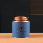 Teedose aus Metall mit chinesischen Motiven