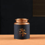 Teedose aus Metall mit chinesischen Motiven